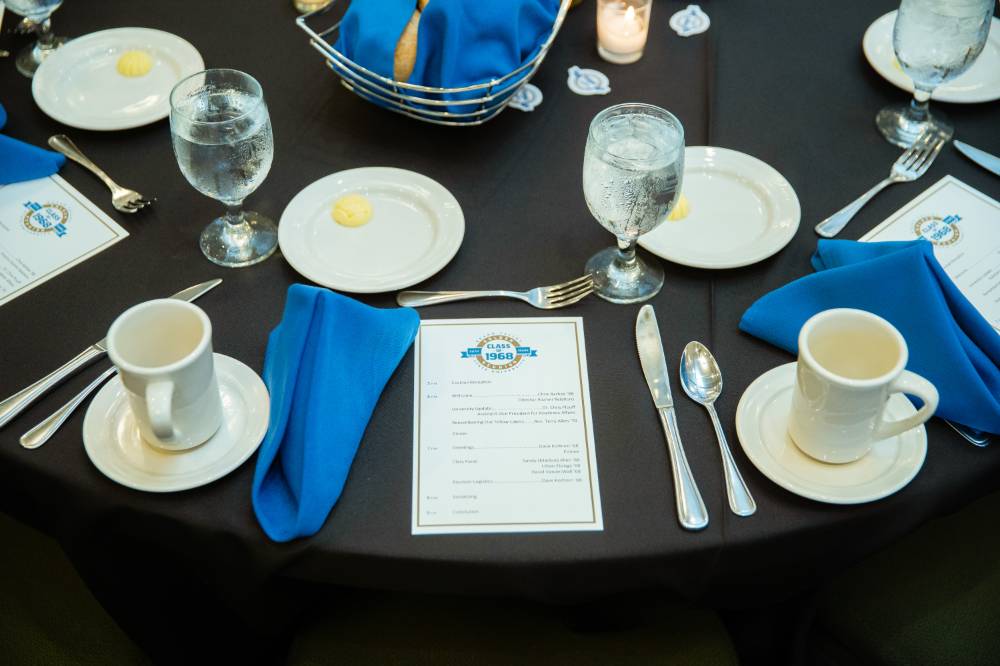 A photo of the table setting at the Reunion Dinner.